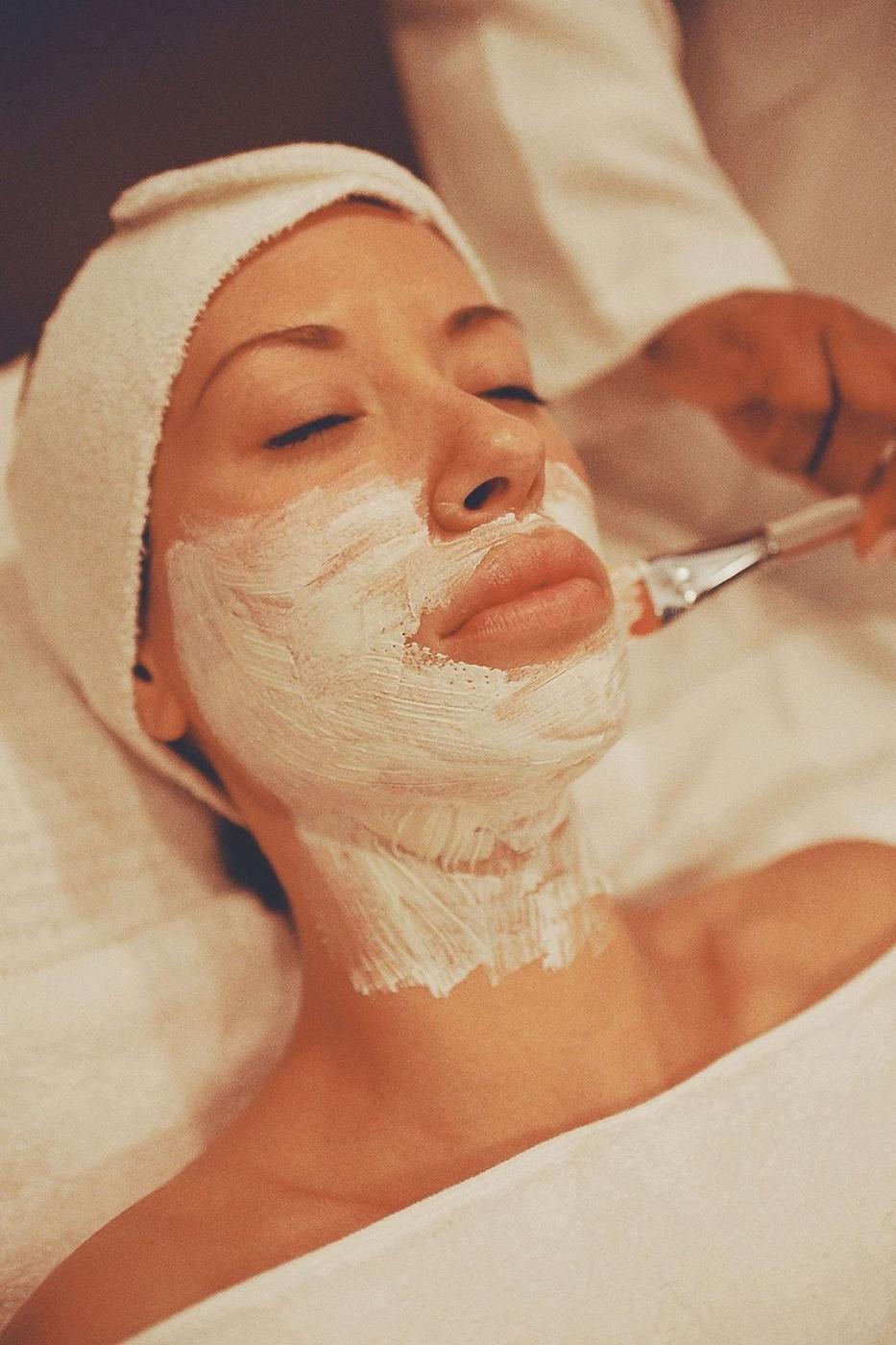 A soothing facial mask being applied